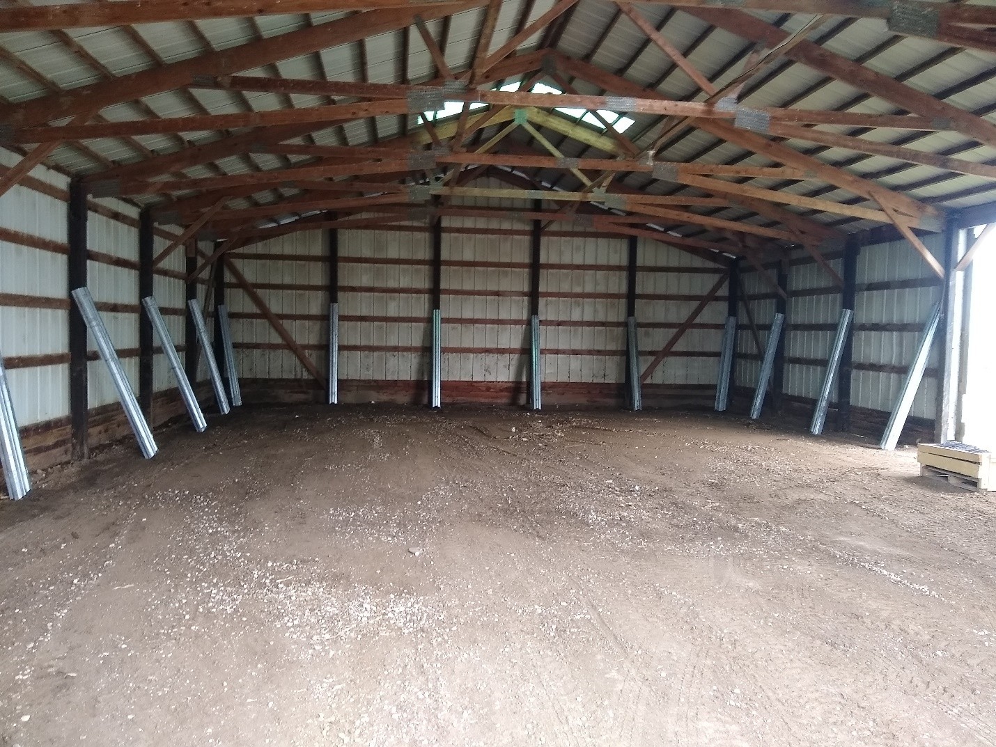 The inside of a barn after recent pole barn repair using Column Repair Sleeves in Pennsylvania