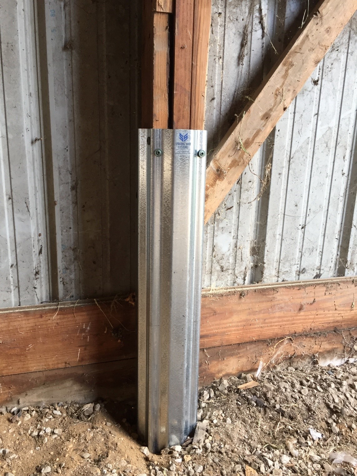 A close up of a repair sleeve used for pole barn repair in Pennsylvania