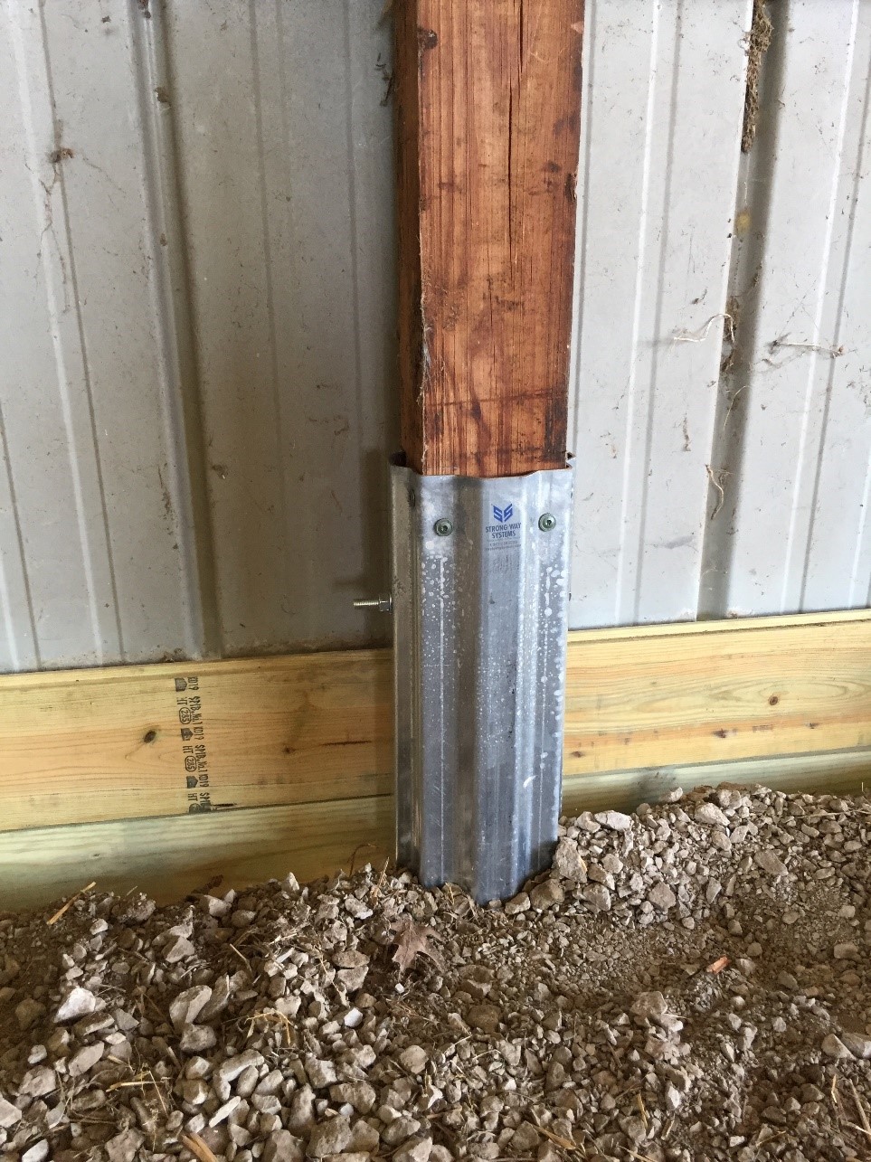 A wood column fixed with post-frame repair in Pennsylvania, using a Column Repair Sleeve