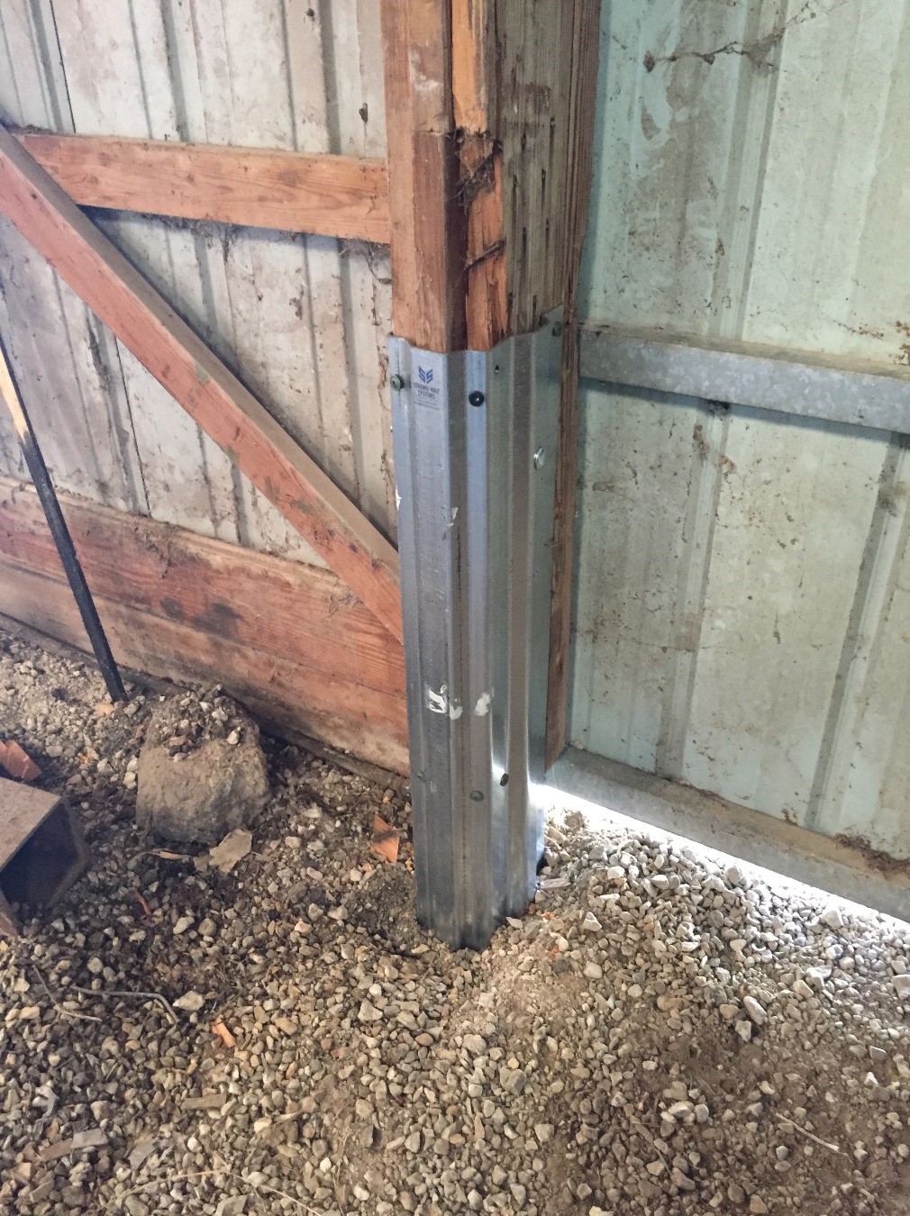 A closeup of a post having undergone column repair in Pennsylvania using Column Repair Sleeves