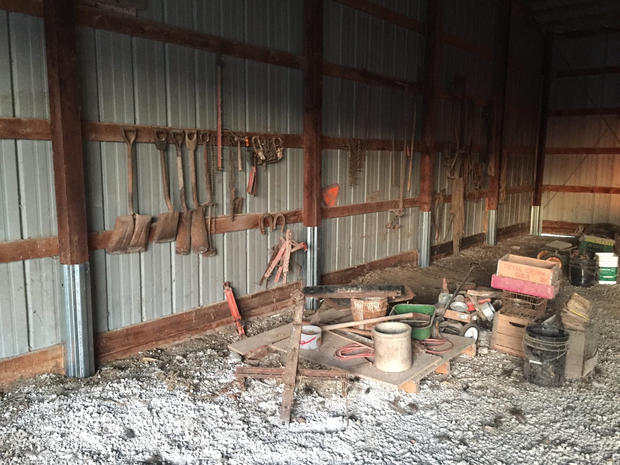 A pole barn is seen during the repair process. The Pole Barn Saver performs rotted post repair near you in Pennsylvania.
