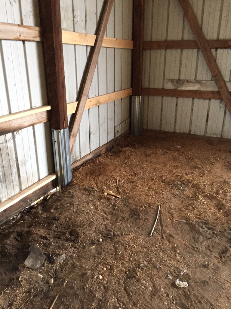 A repaired pole barn post is seen. The Pro Barn Saver knows how to prevent pole barn posts from rotting.