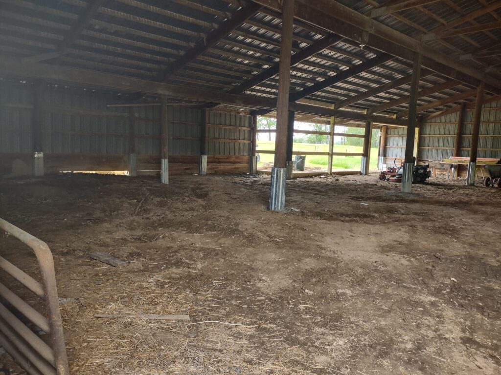 A barn with reinforced columns after The Pro Barn Saver used its repair & installation process to make repairs
